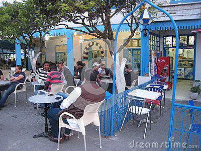 men-chatting-drinking-coffee-shop-sidi-bou-said-tunisia-30200124.jpg