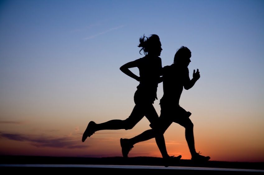 Man-woman-running-in-silhouette.jpg
