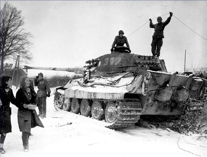 American soldiers inspecting a King Tiger Belgium 1944.jpg