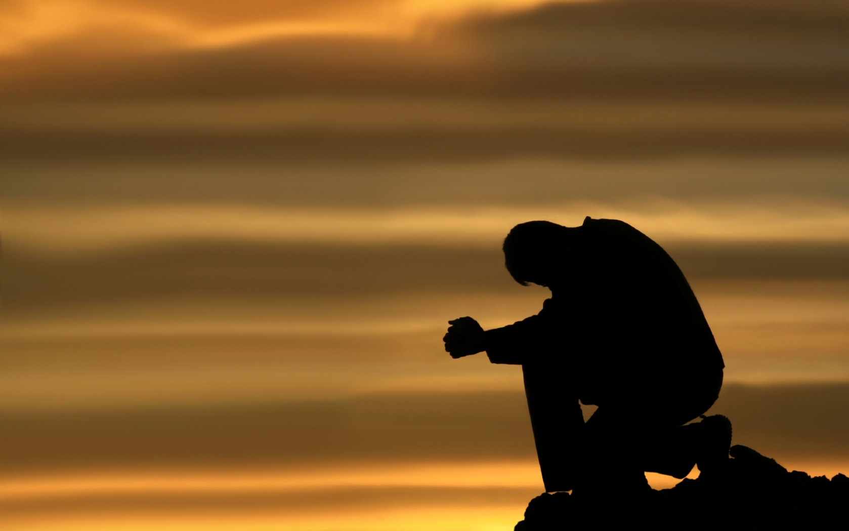 praying-and-kneeling-man.jpg