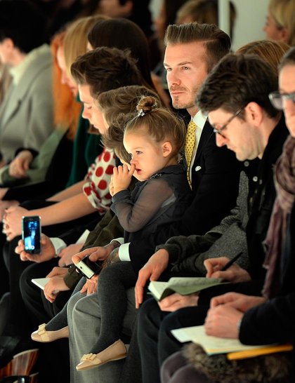 david-beckham-harper-brooklyn-front-row-victoria-beckham-aw2014-getty_GA.jpg