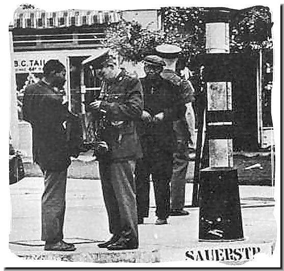 1971apartheid-policeman-checks-pass-of-blacks-1970s.jpg