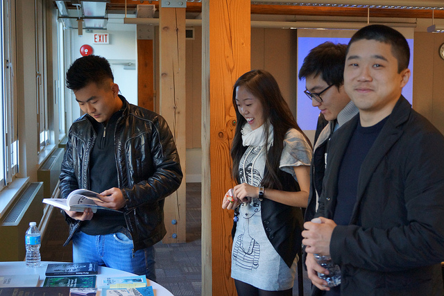 Young Koryo Saram students browsing through the book exhibit.jpg